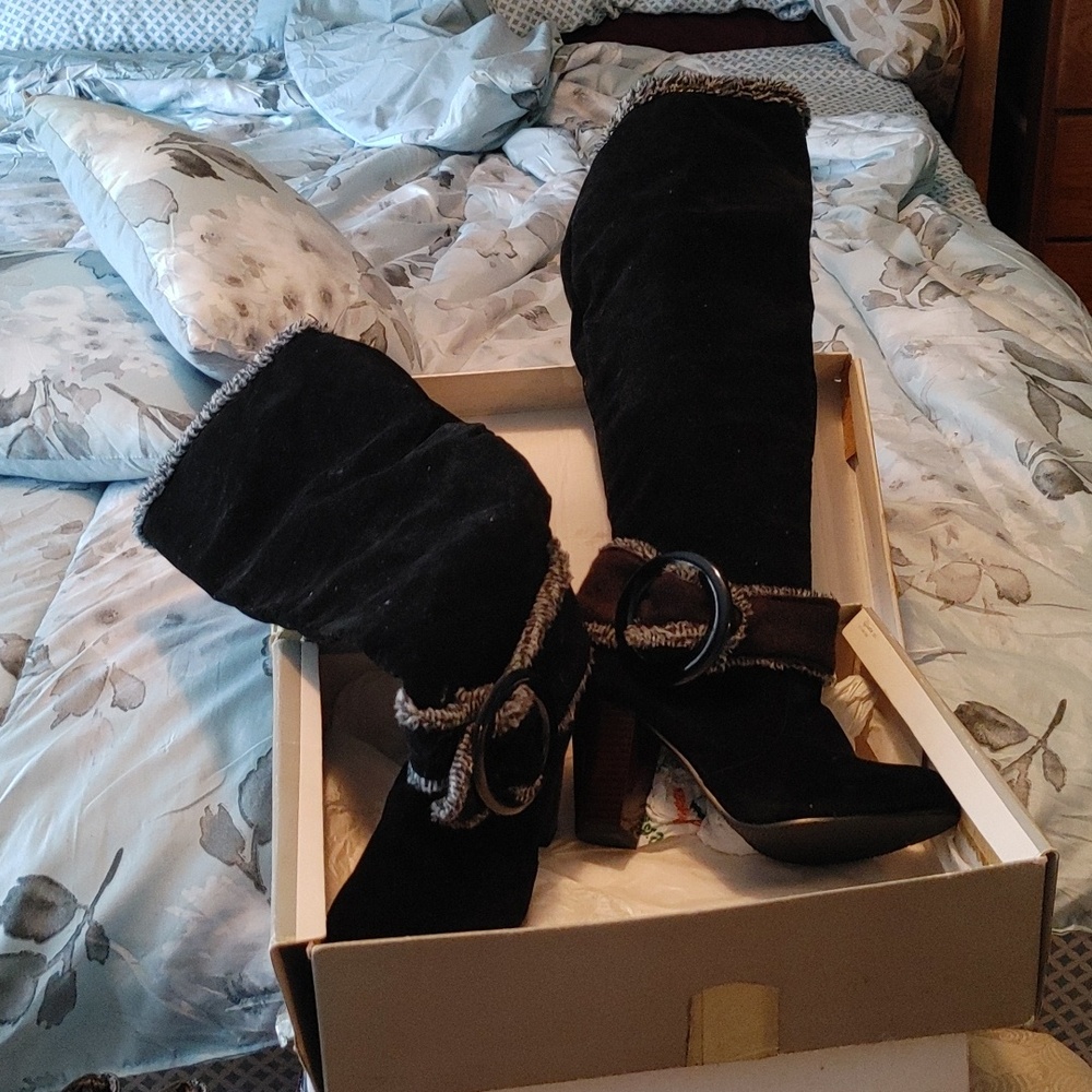 Knee high black. 4inch heel brand new never worn boots